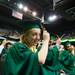 A graduate moves her tassel symbolizing graduation. 
Courtney Sacco I AnnArbor.com 